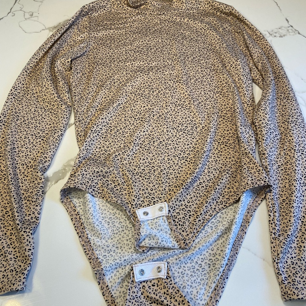 Pale pink and grey leopard bodysuit size S